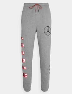 PANTALON  JORDAN SPORT "DNA HBR" GRIS.